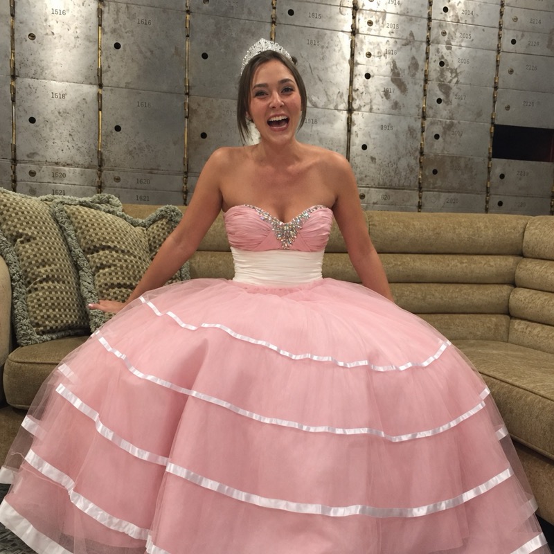 Cait in a pink ball gown and a tiara